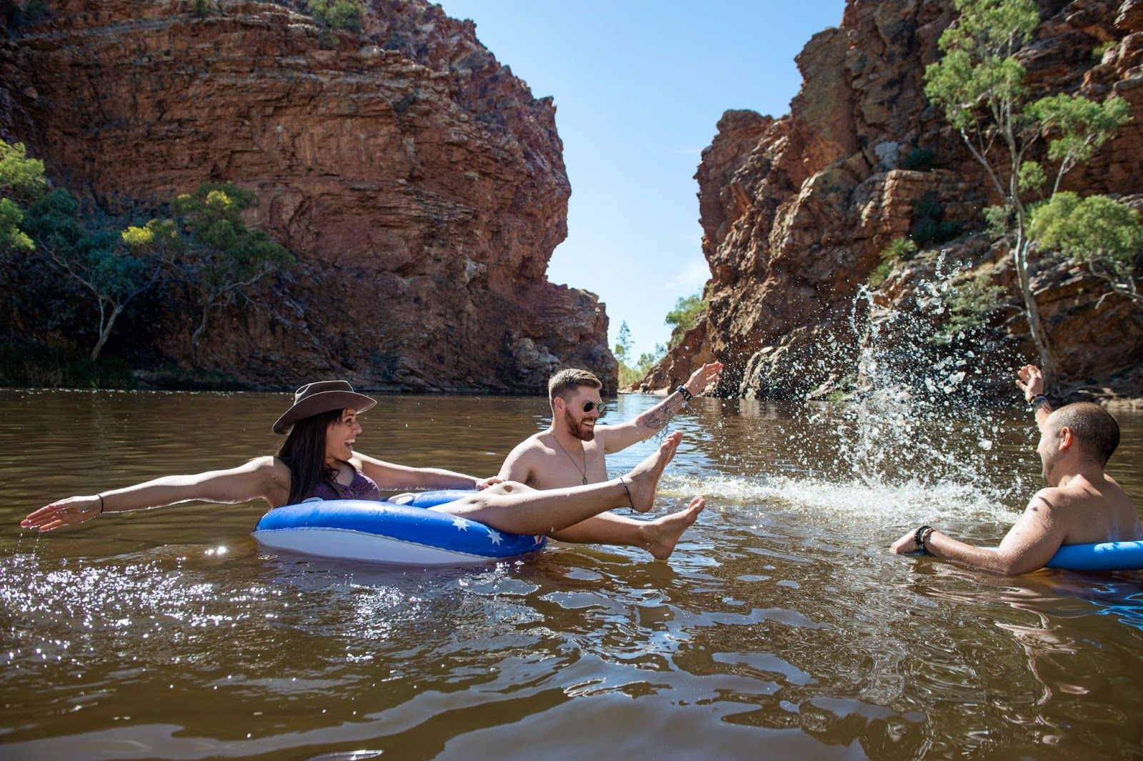 Friends enjoy swimming at Ellery Creek Big Hole Northern Territory.jpg
